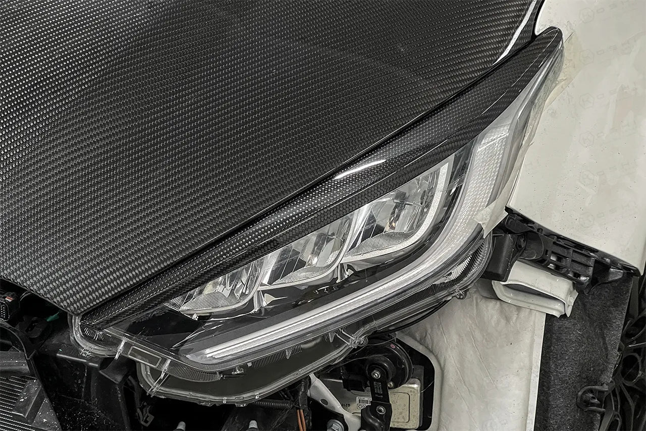 Toyota GR Yaris Headlights Cover (Angry Look) - Carbon Fibre - TMC Motorsport