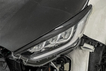 Toyota GR Yaris Headlights Cover (Angry Look) - Carbon Fibre - TMC Motorsport
