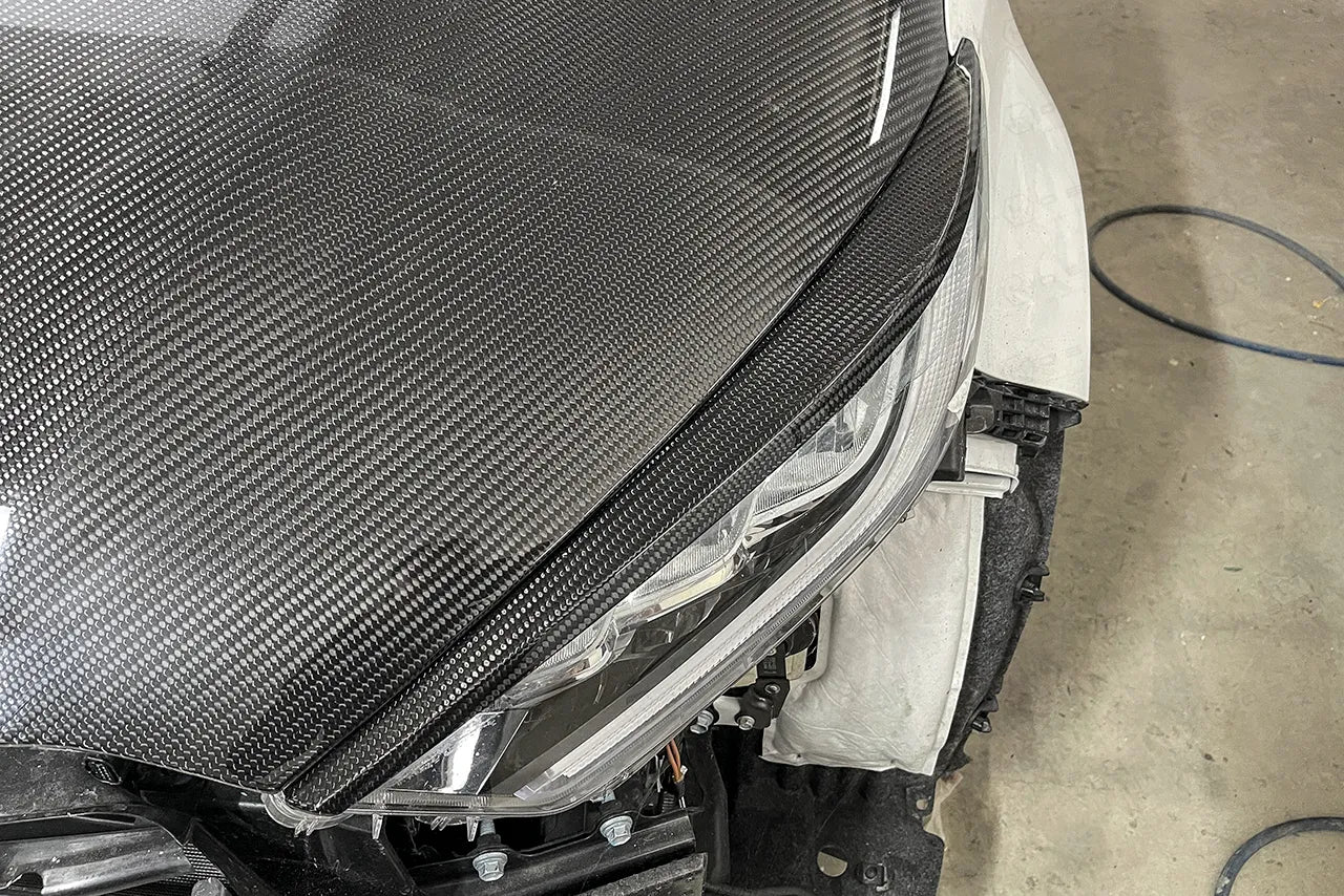 Toyota GR Yaris Headlights Cover (Angry Look) - Carbon Fibre - TMC Motorsport